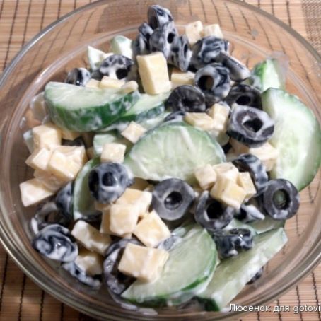 Cucumber salad with olives and cheese