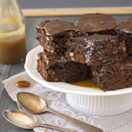Delicious brownies with pecans and caramel sauce
