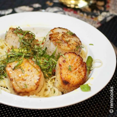 Scallops & Asparagus with Capelli d?angelo & Minneola Tangelo Butter Cream Sauce
