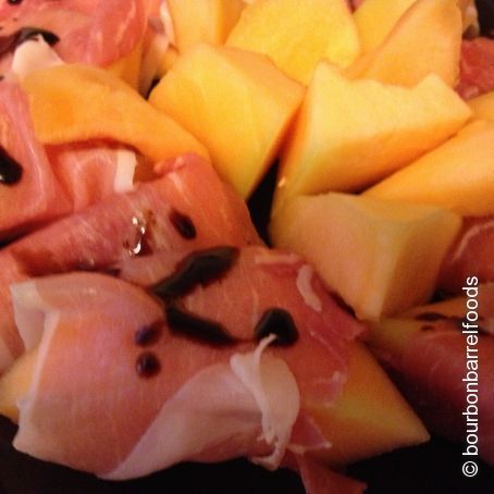 Prosciutto Wrapped Melon with Bourbon Balsamic Sauce