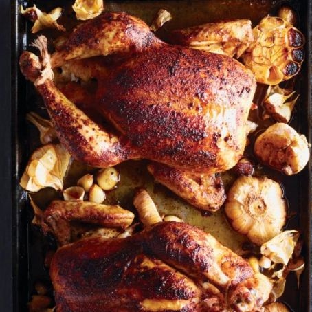 Paprika-Rubbed Chickens with Roasted Garlic
