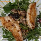 Red mullet fillets on mushrooms and greens