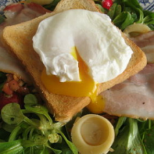 Salad with poached eggs