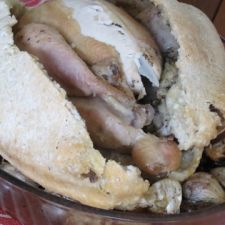 Chicken in salt crust with garlic confit